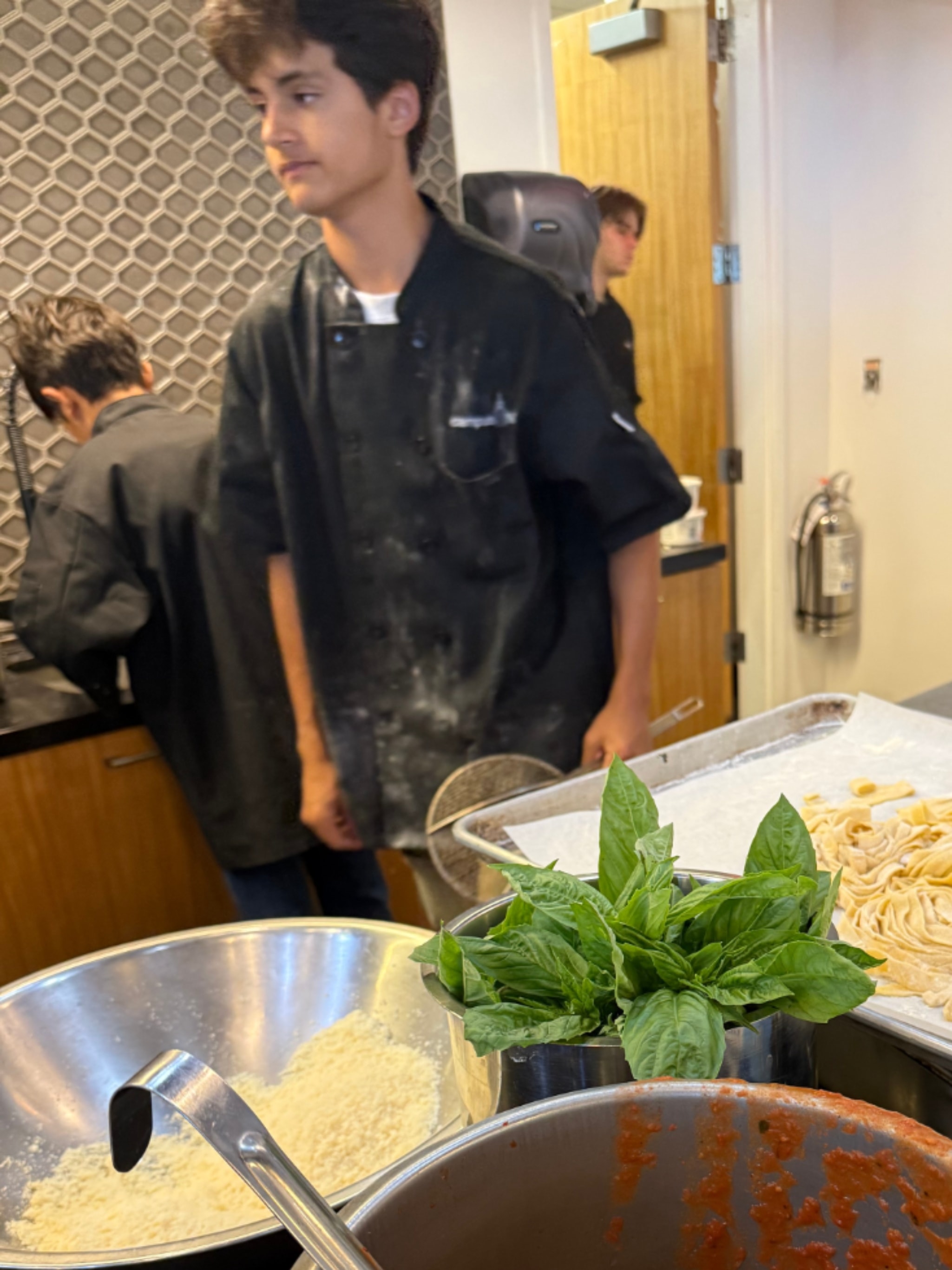 Campers presenting their full meal to the judges